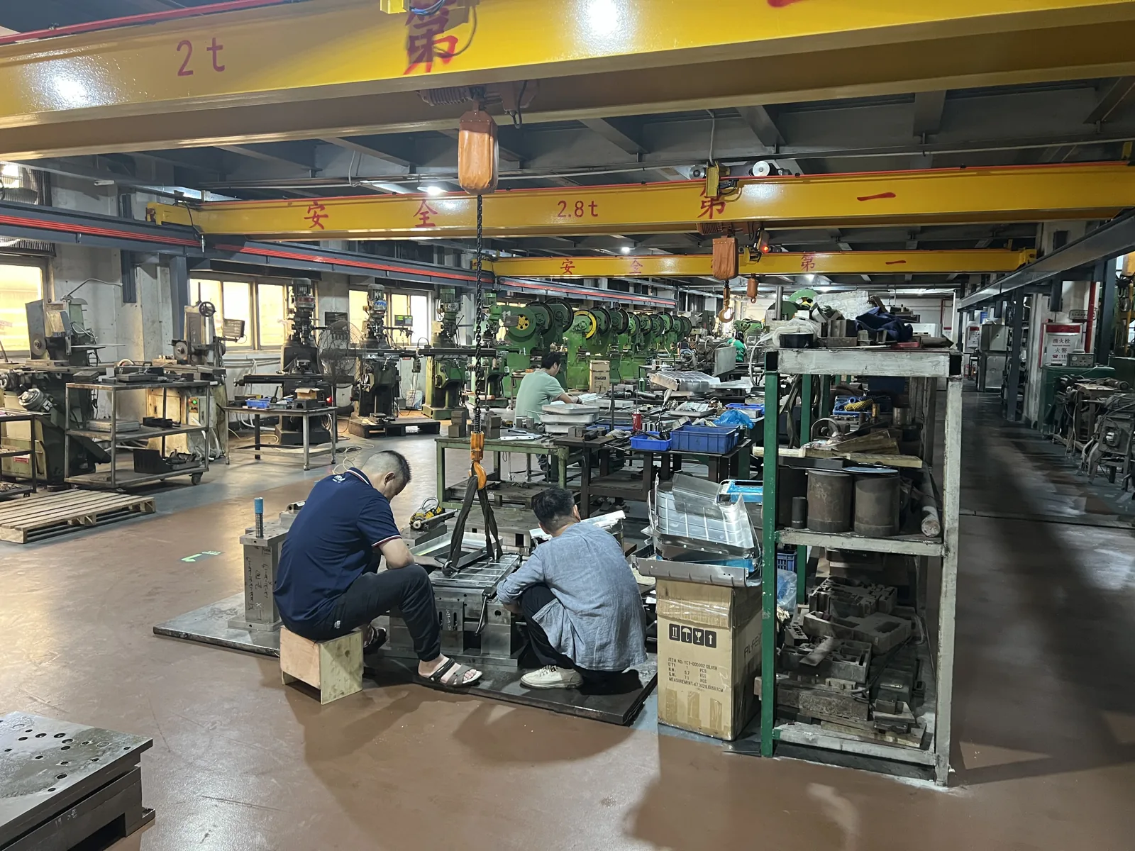 Assembly area where finished aluminum cases are staged before packing