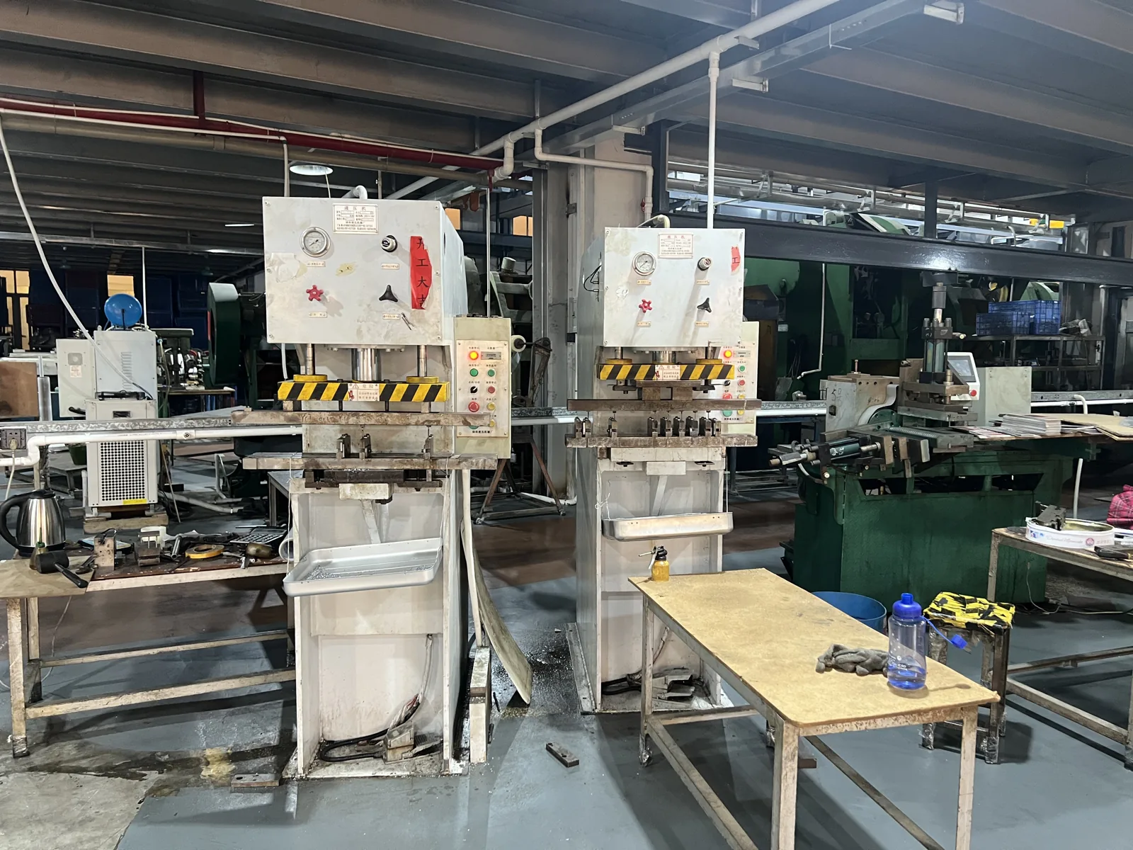 Machine shop equipment used to cut and finish aluminum case parts