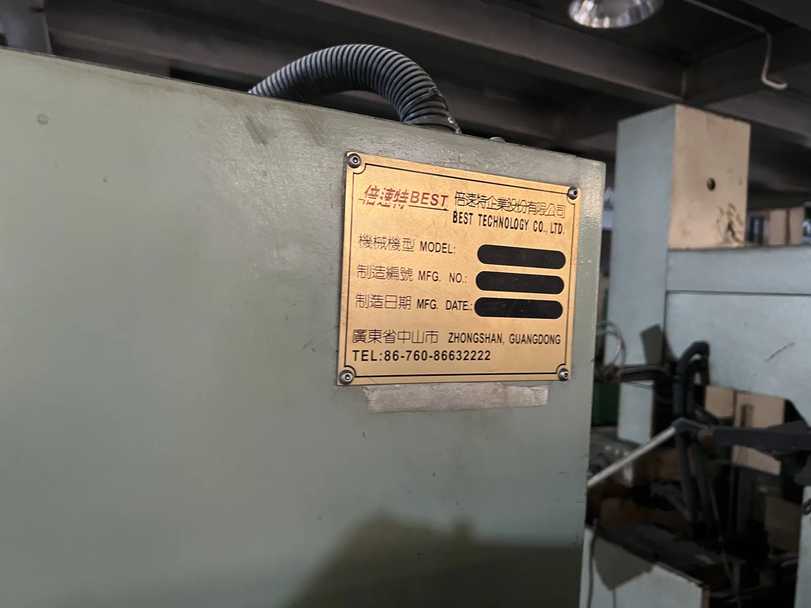 Equipment data plate on a forming machine in the production shop