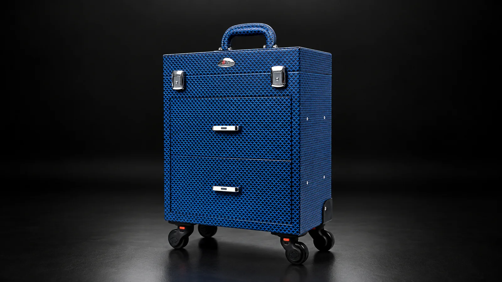 Blue textured makeup trolley case with drawers from the Aluvox factory, studio shot on black