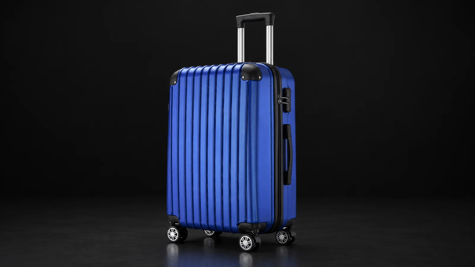 Blue ribbed polycarbonate suitcase from the Aluvox range, studio shot on black