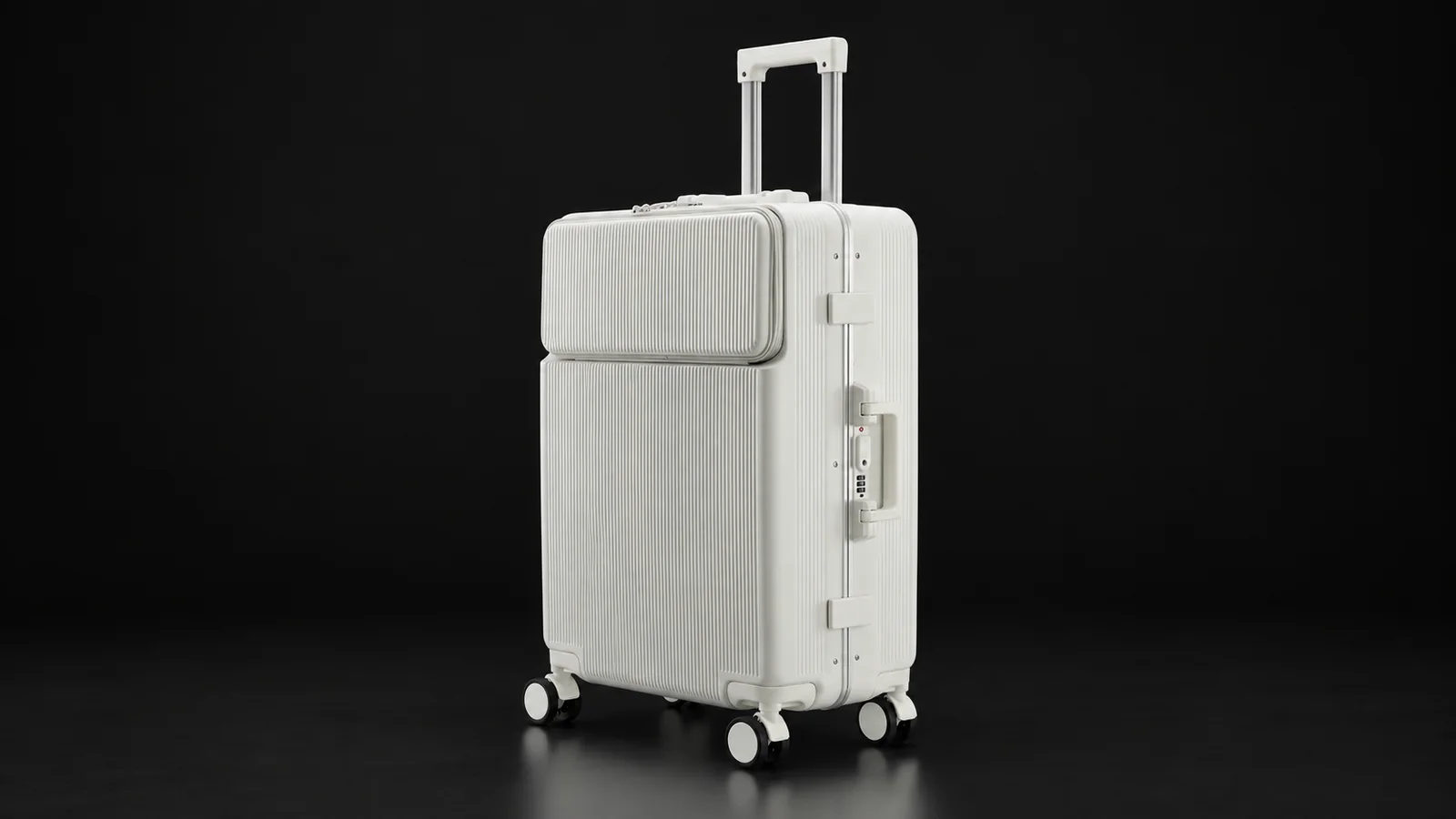Off-white ribbed polycarbonate suitcase with front-opening pocket from the Aluvox range, studio shot on black