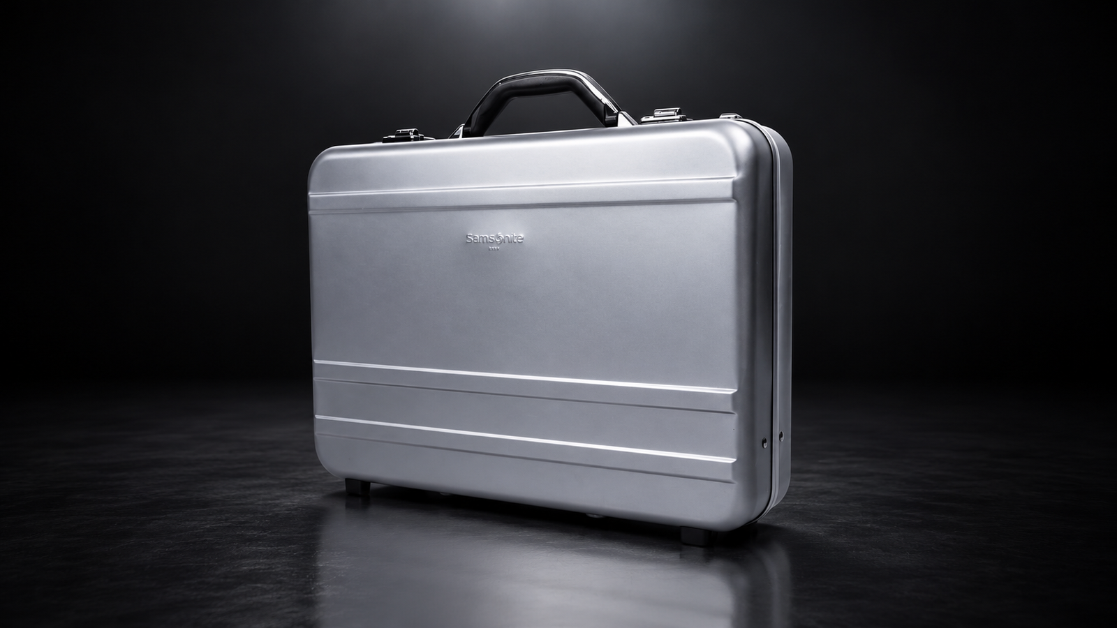 Silver BA0332 aluminum briefcase photographed against a dark background